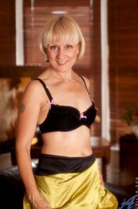 Blonde Mature Woman In Sexy Black Bra