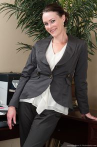 Mature Lady In A Business Outfit